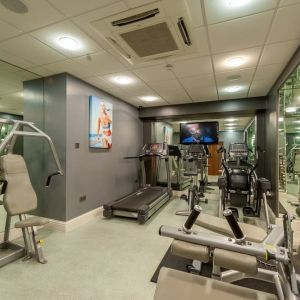 Fully equipped fitness center at Mercure Nottingham City Centre Hotel.