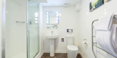 Guest bathroom with shower at Mercure Nottingham City Centre Hotel.