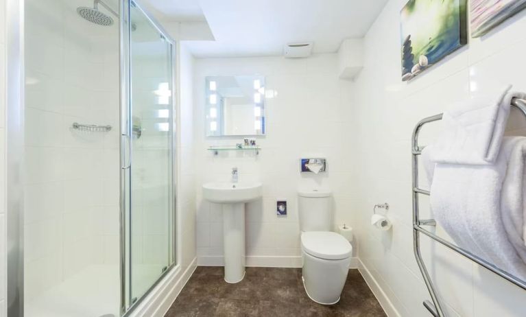 Guest bathroom with shower at Mercure Nottingham City Centre Hotel.