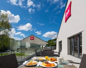 Hotel terrace with sitting area at Ibis Plymouth.