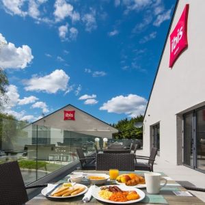 Hotel terrace with sitting area at Ibis Plymouth.