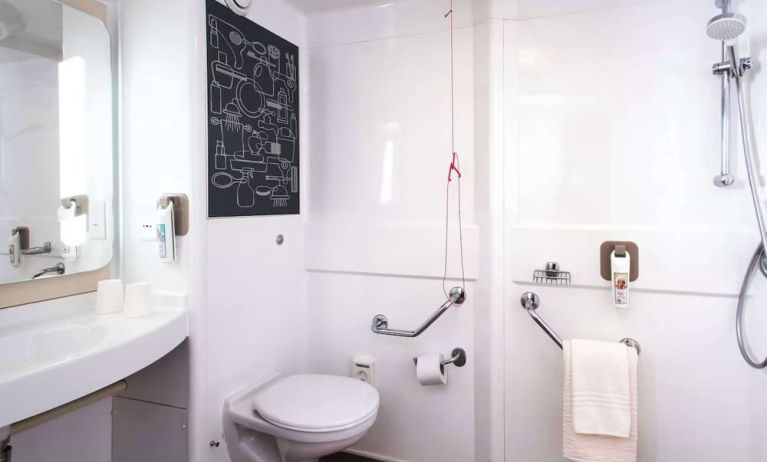 Guest bathroom with shower at Ibis Plymouth.