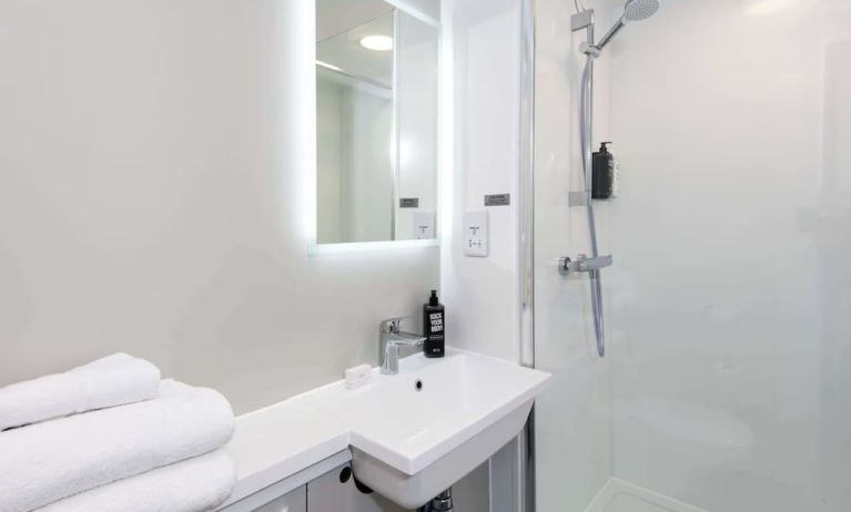 Private guest bathroom with shower at Ibis Plymouth.