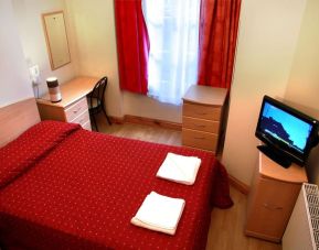 Comfortable day use room with work desk and private bathroom at Elmwood Hotel.