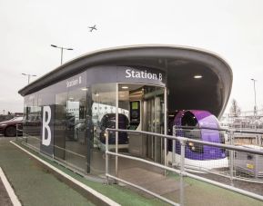 Shuttle service for Thistle London Heathrow Terminal 5 Hotel's guests.