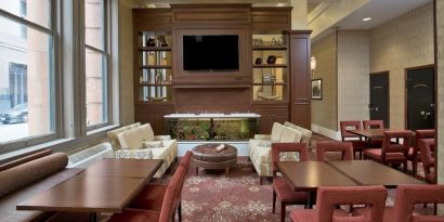 Dining area perfect for coworking at Staybridge Suites Baltimore - Inner Harbor.