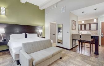 Day use room with kitchen and sofa at Staybridge Suites Baltimore - Inner Harbor.