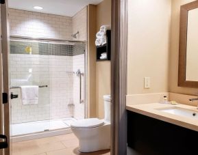 Guest bathroom with shower at Staybridge Suites Baltimore - Inner Harbor.