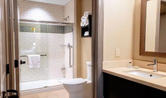 Guest bathroom with shower at Staybridge Suites Baltimore - Inner Harbor.