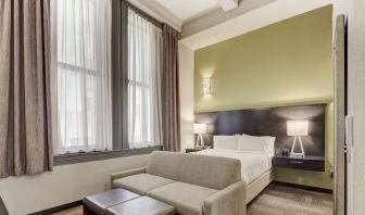 Day use room with sofa at Staybridge Suites Baltimore - Inner Harbor.