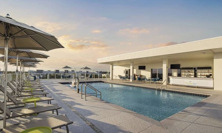 Refreshing outdoor pool at Courtyard Delray Beach.
