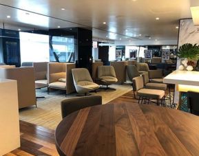 Ample seats with natural light perfect for coworking at Airport Lounge - JFK Terminal 1.