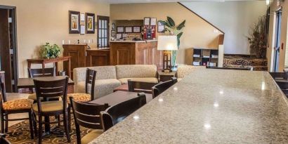 Lobby and coworking lounge at Rodeway Inn Milford.