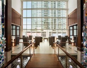 Lobby and coworking lounge at Embassy Suites By Hilton Denver Downtown Convention Center.