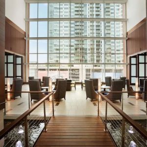 Lobby and coworking lounge at Embassy Suites By Hilton Denver Downtown Convention Center.