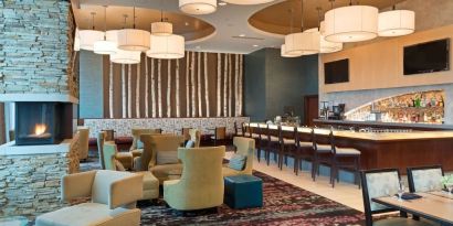 Hotel bar perfect for coworking at Embassy Suites By Hilton Denver Downtown Convention Center.