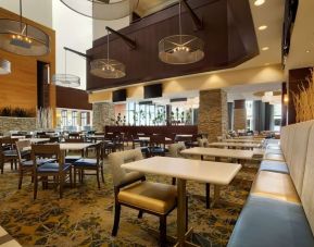 Dining area perfect for coworking at Embassy Suites By Hilton Denver Downtown Convention Center.