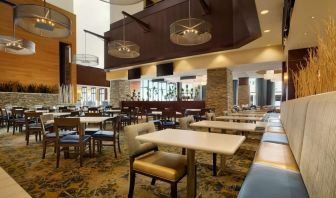 Dining area perfect for coworking at Embassy Suites By Hilton Denver Downtown Convention Center.