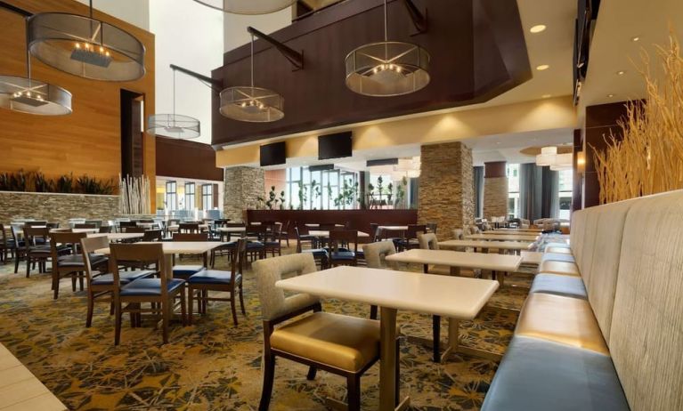 Dining area perfect for coworking at Embassy Suites By Hilton Denver Downtown Convention Center.