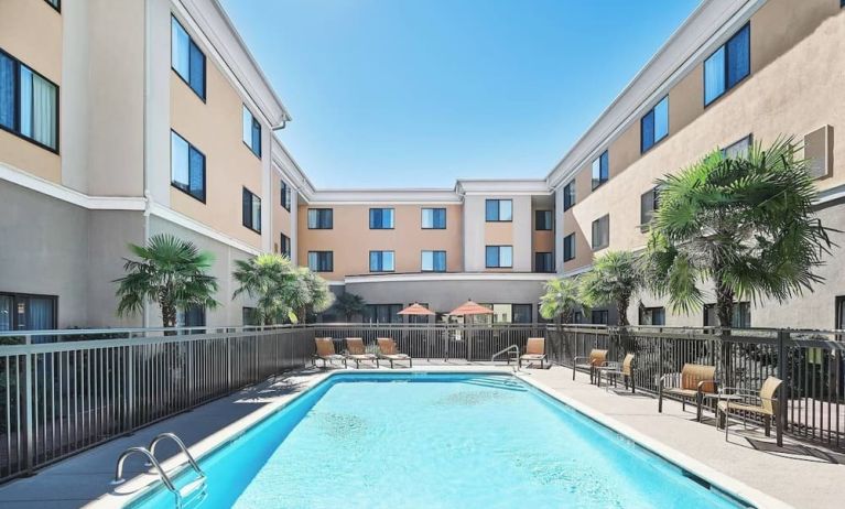 Refreshing outdoor pool at Courtyard Bossier City.