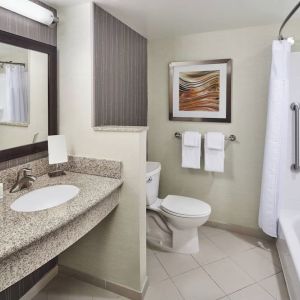 Guest bathroom with shower at Courtyard Bossier City.