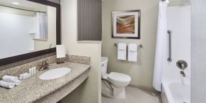 Guest bathroom with shower at Courtyard Bossier City.