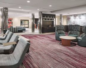 Lobby and coworking lounge at Courtyard Bossier City.