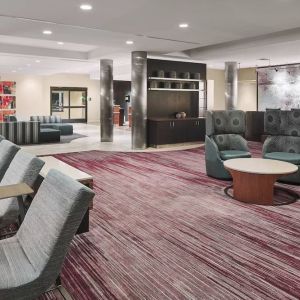 Lobby and coworking lounge at Courtyard Bossier City.