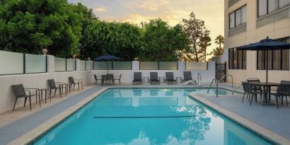 Refreshing outdoor pool at Courtyard By Marriott Cypress Anaheim.