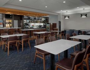 Dining area perfect for coworking at Courtyard By Marriott Cypress Anaheim.