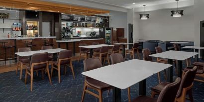 Dining area perfect for coworking at Courtyard By Marriott Cypress Anaheim.