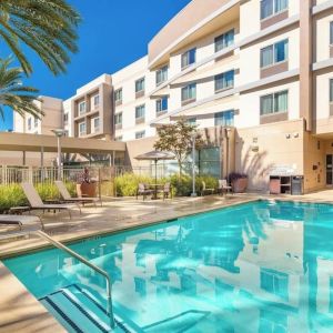 Refreshing outdoor pool at Courtyard By Marriott Santa Ana Orange County.