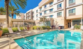 Refreshing outdoor pool at Courtyard By Marriott Santa Ana Orange County.