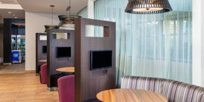 Media pods perfect for coworking at Courtyard By Marriott Santa Ana Orange County.