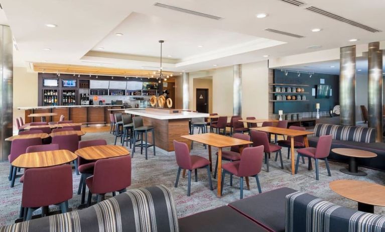 Dining area perfect for coworking at Courtyard By Marriott Santa Ana Orange County.