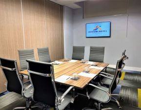 Professional meeting room with ergonomic chairs at Atrium Hotel Heathrow.