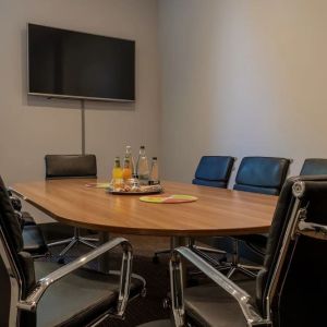 Professional meeting room at London City Airport Hotel.