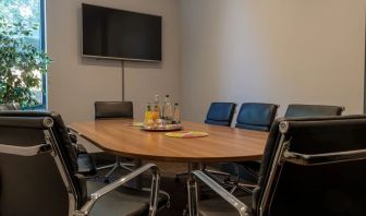 Professional meeting room at London City Airport Hotel.