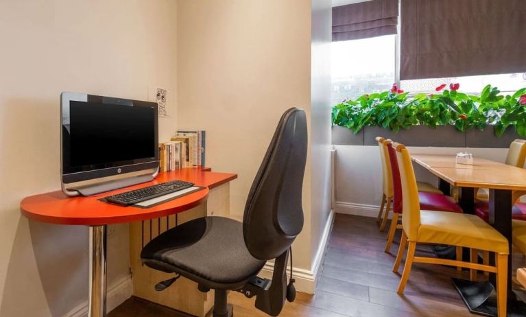 Workspace with computer and ergonomic chair at Comfort Inn Edgware Road.