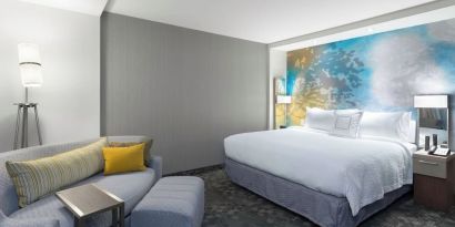 Day use room with sofa at Courtyard By Marriott Ruston.
