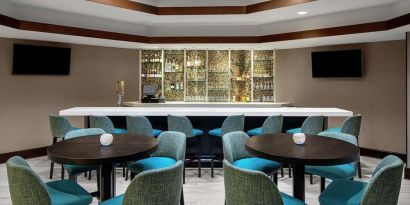 Hotel bar at DoubleTree Suites By Hilton Hotel Charlotte - SouthPark.