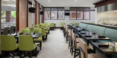 Dining area perfect for coworking at DoubleTree Suites By Hilton Hotel Charlotte - SouthPark.