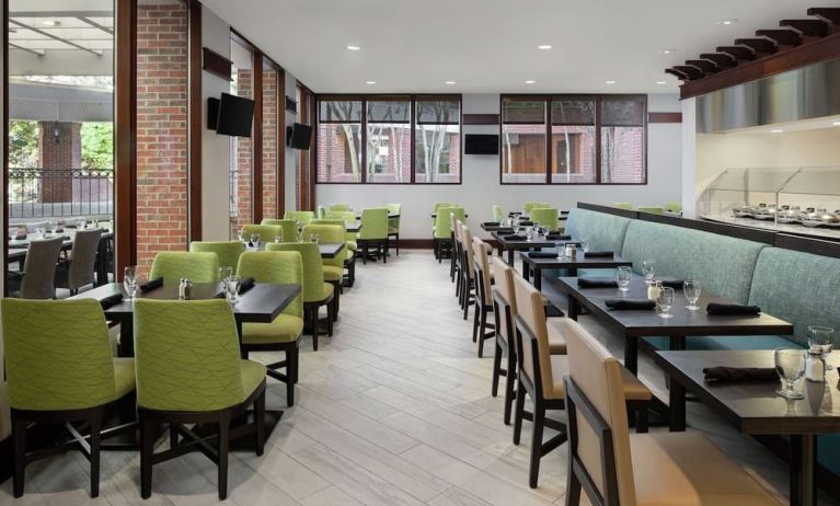 Dining area perfect for coworking at DoubleTree Suites By Hilton Hotel Charlotte - SouthPark.