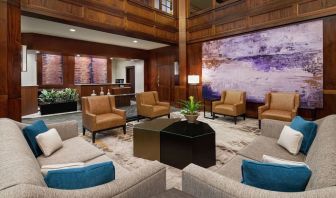 Lobby and coworking lounge at DoubleTree Suites By Hilton Hotel Charlotte - SouthPark.