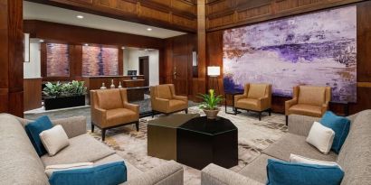 Lobby and coworking lounge at DoubleTree Suites By Hilton Hotel Charlotte - SouthPark.