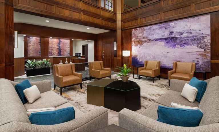 Lobby and coworking lounge at DoubleTree Suites By Hilton Hotel Charlotte - SouthPark.