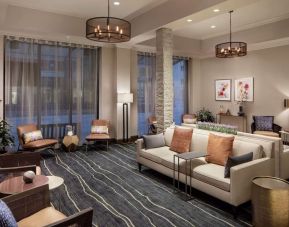 Lobby and coworking lounge at Embassy Suites By Hilton Fort Worth Downtown.
