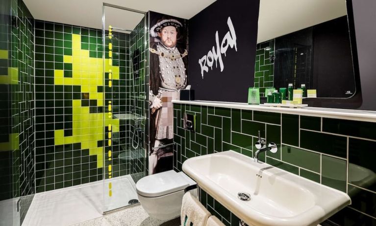 Guest bathroom with shower at nhow London.