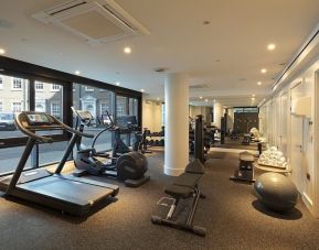 Fully equipped fitness center at Tower Suites Hotel by Blue Orchid.