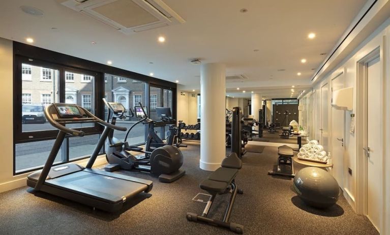 Fully equipped fitness center at Tower Suites Hotel by Blue Orchid.